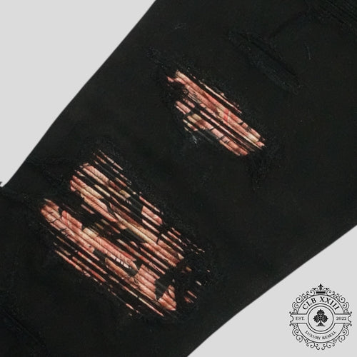 Amiri Banana Leaf Patch Thrasher Jeans in Black