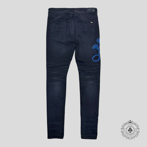 Amiri Blue Poison Archival Skinny Jeans in Black