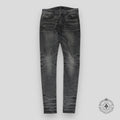 Amiri Faded Denim Jeans in Grey