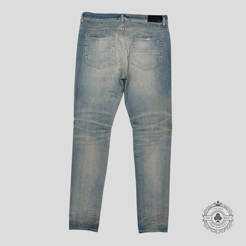 Amiri Cherub Print Jeans in Clay Indigo