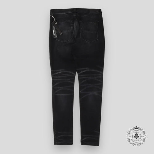 Amiri Leopard Patch Thrasher Jeans in Black