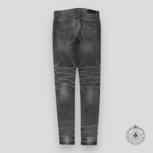 Amiri Faded Denim Jeans in Grey