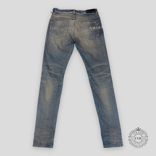 Amiri Hibiscus Stencil Jeans in Light Indigo